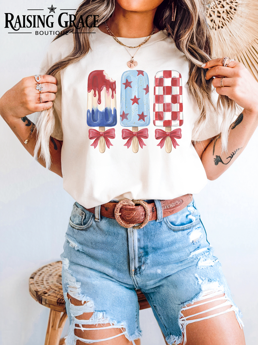 Patriotic Popsicle Shirt | Coquette Bow 4th of July Tee | Red White Blue Summer Graphic Tee | Cute Americana Shirt | Women's Boutique Tee