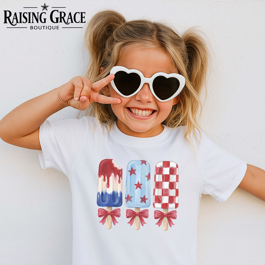 Youth Patriotic Popsicle Shirt | Girls 4th of July Tee | Red White Blue Summer Shirt | Cute Coquette Bow Graphic Tee | Kids Americana Tee