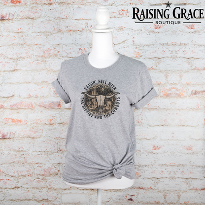 Raisin’ Hell With The Hippies And The Cowboys Graphic T-Shirt | Western Graphic Tee | Cowgirl Shirt | Boutique Western Tee | Country Concert Shirt